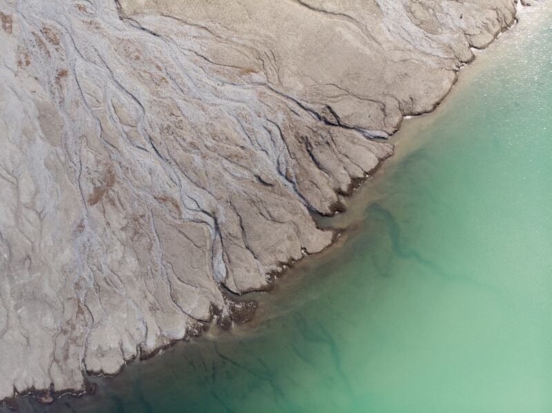 The Kloental lake's low water level in Glarus, Switzerland. EPA