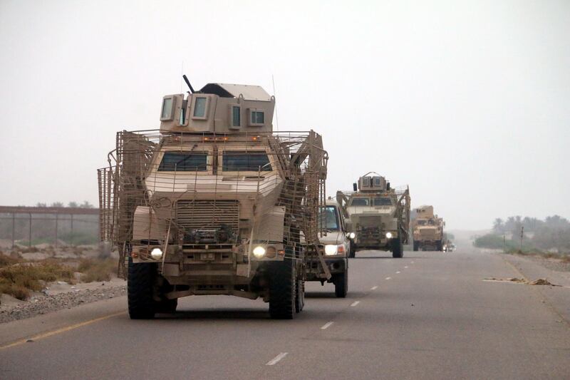 epa06803032 Yemeni forces backed by the Saudi-led coalition gather near the outskirts of the western port city of Hodeidah, Yemen, 12 June 2018. According to reports, the Saudi-led military coalition and Yemeni government forces continue to send reinforcements toward the port city of Hodeidah, preparing to launch an assault on the Houthis-controlled main port of Yemen.  EPA/NAJEEB ALMAHBOOBI