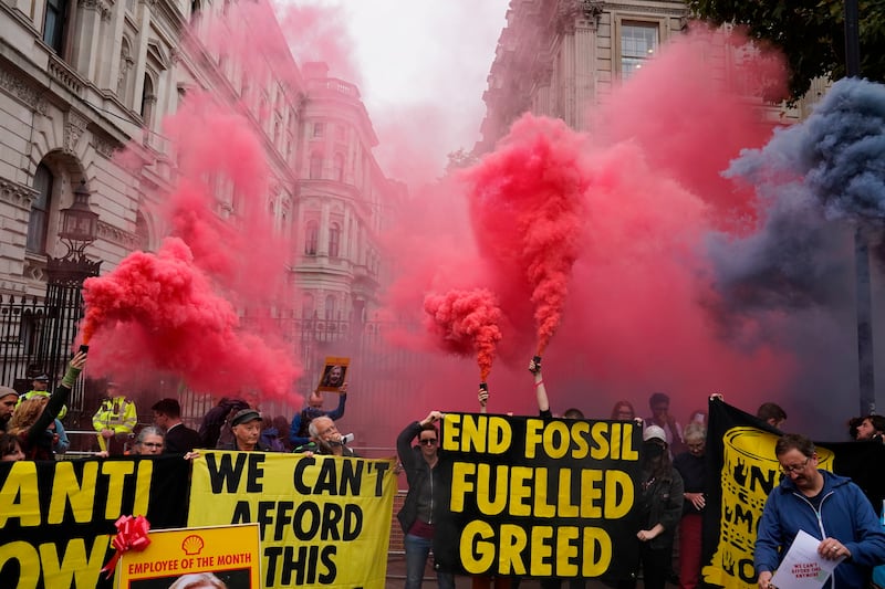 Members of Extinction Rebellion protest outside Downing Street. PA