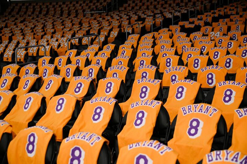 The Los Angeles Lakers honor the late Kobe Bryant by laying out T-shirts for fans prior to the team's NBA match against the Portland Trail Blazers in Los Angeles, on Friday, January 31. AP