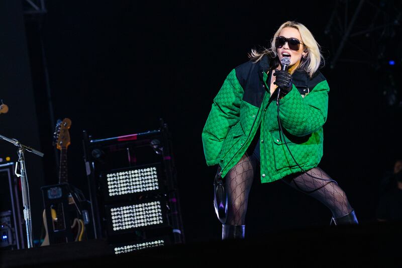 Miley Cyrus is one of the many music stars to play Lollapalooza, she is pictured here at the Brazil festival in March. Getty Images