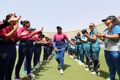 UAE captain Chaya Mughal walks off the field after her final game in international cricket. Chris Whiteoak / The National