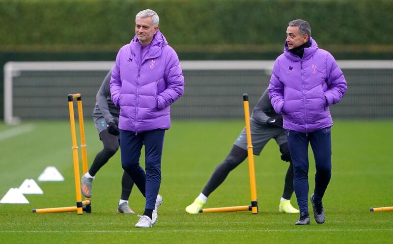 Tottenham Hotspur manager Jose Mourinho, left. PA
