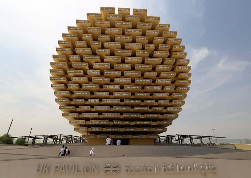 The UK pavilion highlights the country's accomplishments in artificial intelligence and space sector. AP Photo