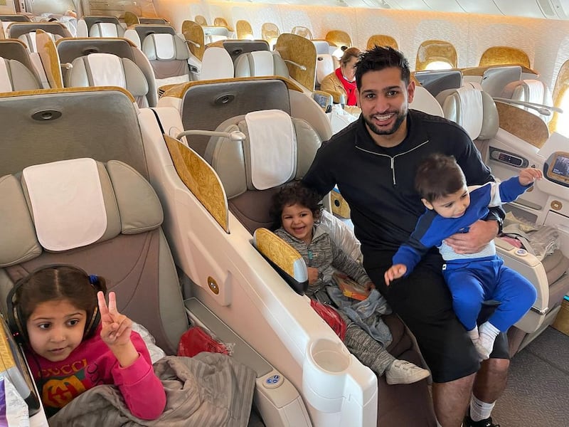 Amir Khan flies Emirates to Dubai with his three childen, Lamaisah, Alayna and Muhammad, on April 1, 2021. Instagram / Amir Khan 