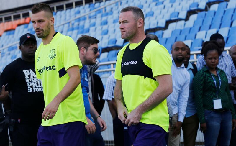 Soccer Football - Everton Training - Dar es Salaam, Tanzania - July 12, 2017   Everton's Wayne Rooney and Morgan Schneiderlin arrive for a training session at the National stadium in Dar es Salaam   REUTERS/Thomas Mukoya