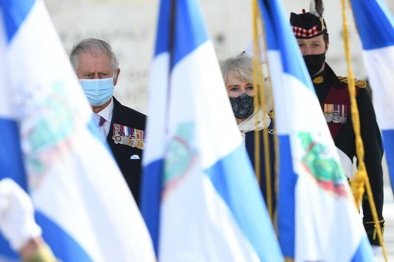 Prince Charles and Camilla during the wreath laying ceremony. Getty Images