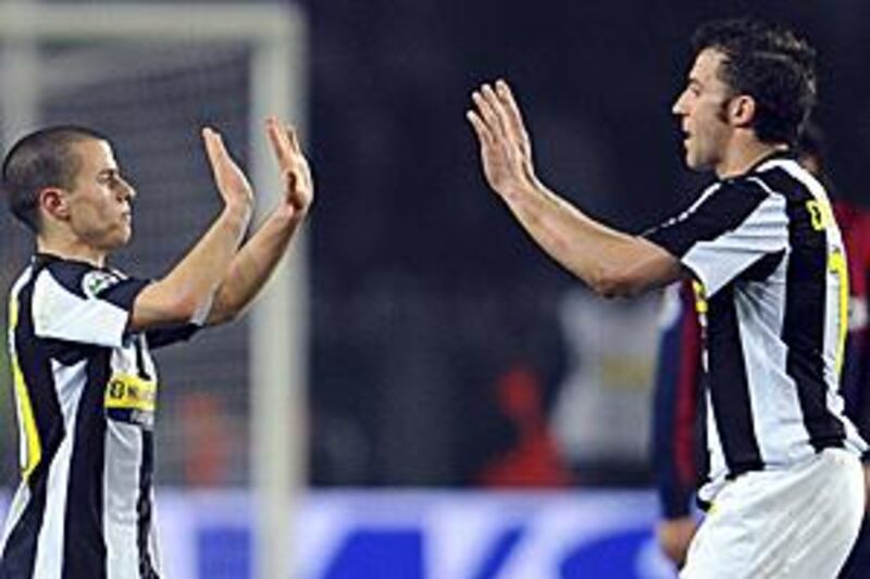 Sebastian Giovinco, left, celebrates with fellow goalscorer Alessandro Del Piero during the 5-2 win over Bologna in Turin on Saturday night.