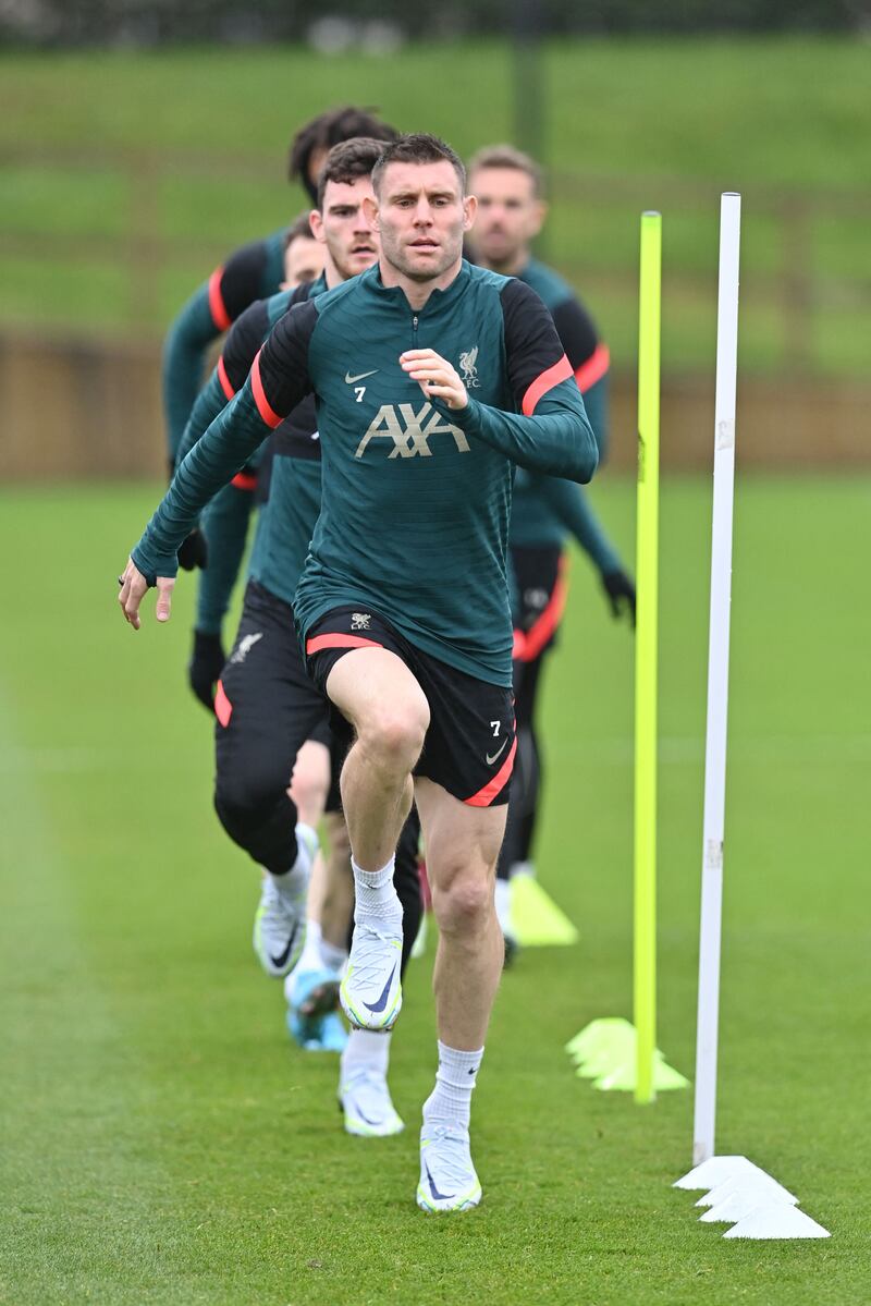 James Milner training with teammates. AFP