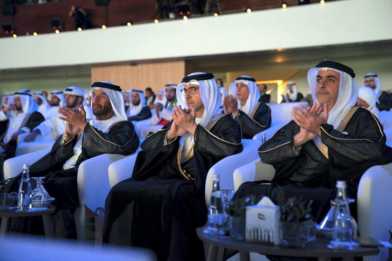 ABU DHABI, UNITED ARAB EMIRATES - December 02, 2019: (R-L) HH Lt General Sheikh Saif bin Zayed Al Nahyan, UAE Deputy Prime Minister and Minister of Interior, HH Sheikh Hazza bin Zayed Al Nahyan, Vice Chairman of the Abu Dhabi Executive Council and HH Sheikh Suroor bin Mohamed Al Nahyan, watche a performance of ‘Legacy of Our Ancestors’, during the 48th UAE National Day celebrations, at Zayed Sports City.

( Hamad Al Kaabi  / Ministry of Presidential Affairs )
---