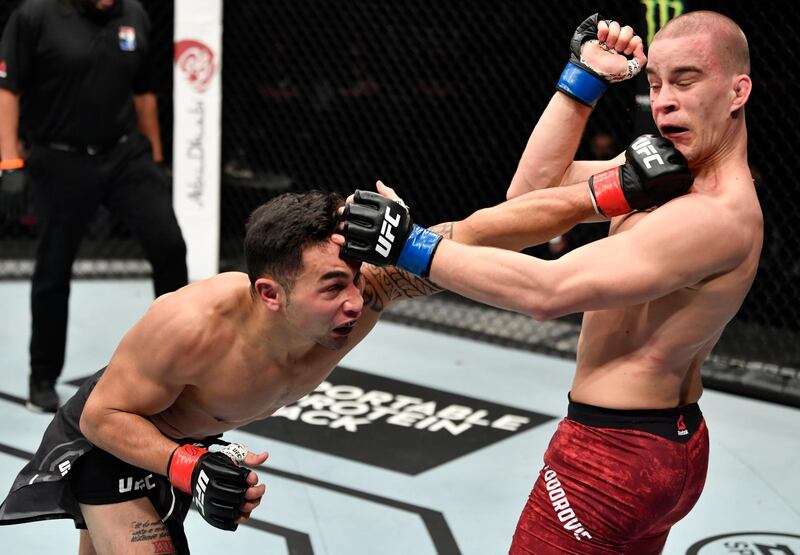 ABU DHABI, UNITED ARAB EMIRATES - JANUARY 17: (L-R) Punahele Soriano punches Dusko Todorovic of Serbia in a middleweight bout during the UFC Fight Night event at Etihad Arena on UFC Fight Island on January 17, 2021 in Abu Dhabi, United Arab Emirates. (Photo by Jeff Bottari/Zuffa LLC)