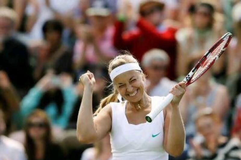 Sabine Lisicki is enjoying at Wimbledon a year after she became the second wildcard entry to enter the semi-finals here. Kirsty Wigglesworth / AP Photo