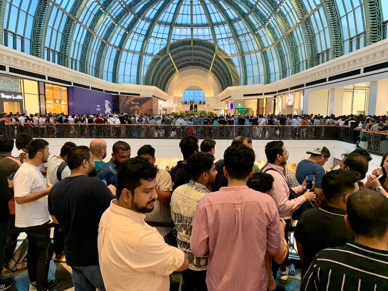 People queue for the iPhone 15 at Mall of the Emirates in Dubai. Pawan Singh / The National