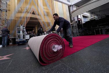 epa07386498 Worker roll out the red carpet during preparations for the 91st annual Academy Awards in Hollywood, California, USA, 21 February 2019. The Oscars are presented for outstanding individual or collective efforts in 24 categories in filmmaking. EPA/JOHN G. MABANGLO