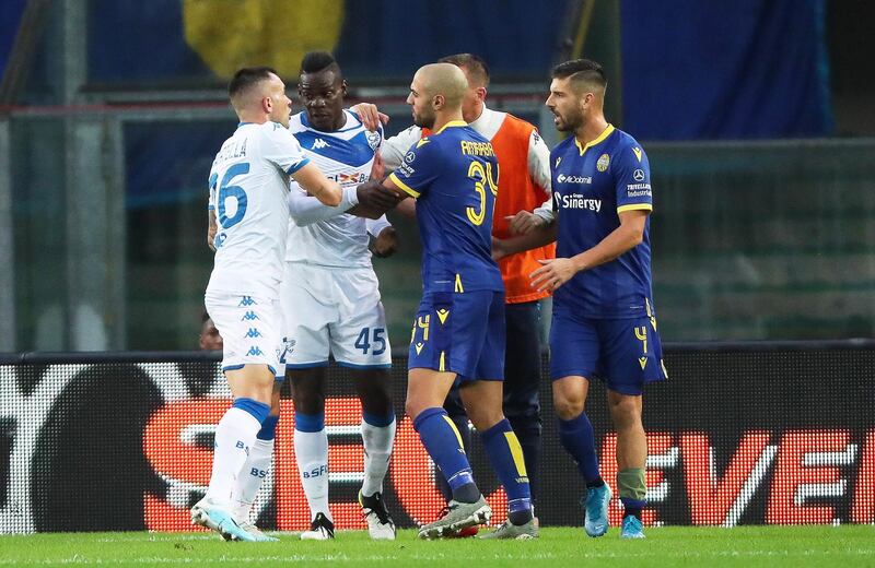 Brescia's Mario Balotelli reacts after suffering racist chants from Verona supporters. EPA