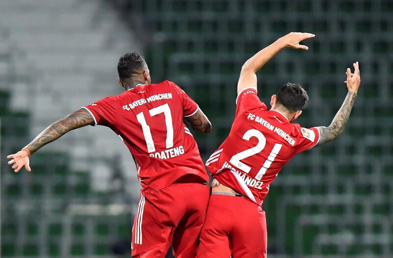 Bayern Munich's Jerome Boateng and Lucas Hernandez celebrate after winning the match and the Bundesliga title for Bayern Munich. Reuters