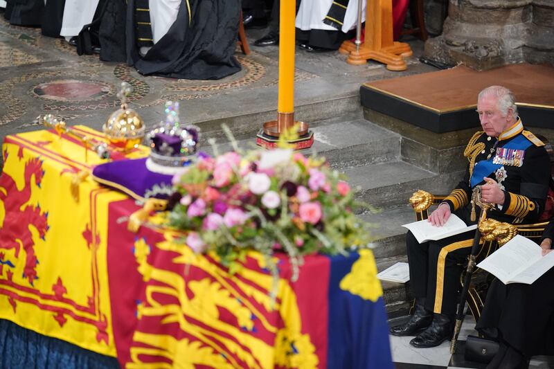 King Charles looks towards the coffin of his mother at Westminster Abbey. Getty Images