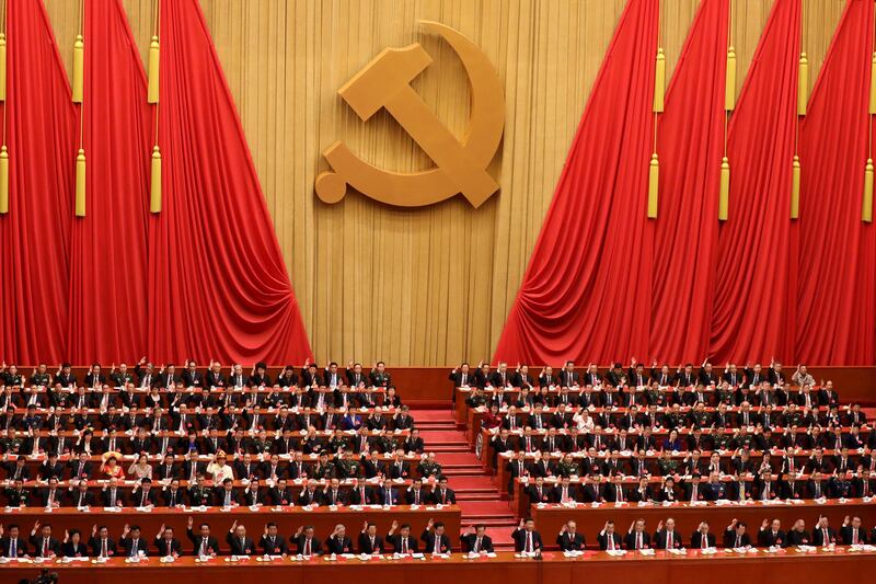 epaselect epa06285331 Delegates raise their hands as they take a vote during the closing ceremony of the 19th National Congress of the Communist Party of China (CPC) at the Great Hall of the People (GHOP) in Beijing, China, 24 October 2017. According to media reports on 24 October 2017, the National Congress of the Communist Party of China voted to enshrine the signature ideology of President Xi Jinping into the Chinese Communist Party constitution, elevating him to the country's most influential and powerful leader in decades. President Xi Jinping was also granted another five years in power during 19th Congress of the Communist Party of China.  EPA/WU HONG