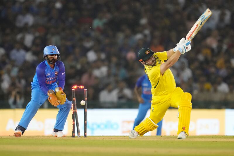Australia's captain Aaron Finch is bowled by India's Axar Patel on Tuesday. AP