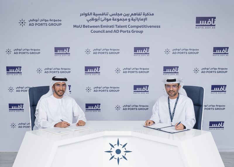 Ghannam Al Mazrouei, Secretary General of Nafis, left, with Capt Mohamed Al Shamisi, managing director and group chief executive of AD Ports Group, at the signing of the Nafis agreement.  Photo: Nafis