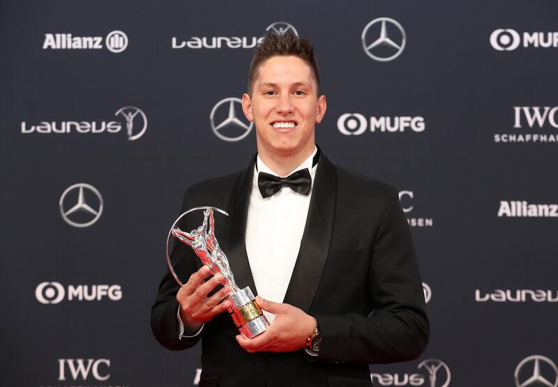 epa06569354 Brazilian soccer player Jakson Ragnar Follmann, representing Brazilian football team Chapecoense, poses with the 'Laureus Best Sporting Moment of the Year Award' at the 2018 Laureus World Sports Awards in Monaco, 27 February 2018. The annual Laureus Awards are held to honor people whom make a notable impact and remarkable accomplishments in the world of sport throughout the year.  EPA/SEBASTIEN NOGIER