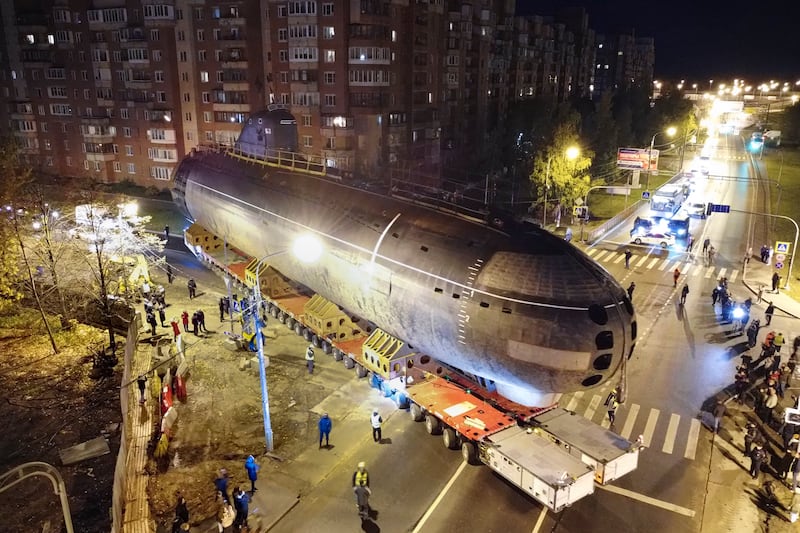 The bow of the Soviet submarine 'Leninsky Komsomol' is taken to a museum in Kronstadt, outside Saint Petersburg, Russia. AP