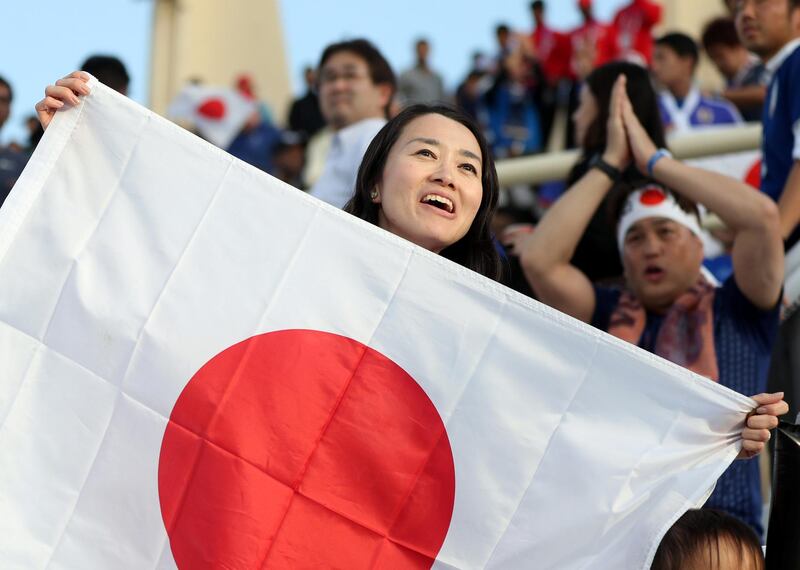 Abu Dhabi, United Arab Emirates - January 09, 2019: Japan fans celebrate victory after the game between Japan and Turkmenistan in the Asian Cup 2019. Wednesday, January 9th, 2019 at Al Nahyan Stadium, Abu Dhabi. Chris Whiteoak/The National