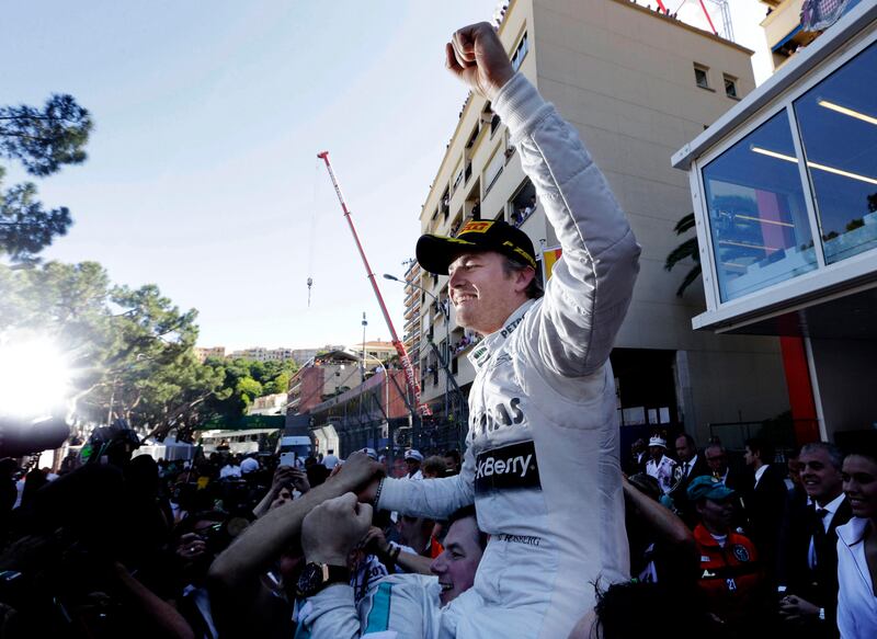 Mercedes driver Nico Rosberg of Germany celebrates after winning the Formula One Grand Prix at the Monaco racetrack, in Monaco, Sunday, May 26, 2013. (AP Photo/Luca Bruno) *** Local Caption ***  Monaco F1 GP Auto Racing.JPEG-0b295.jpg