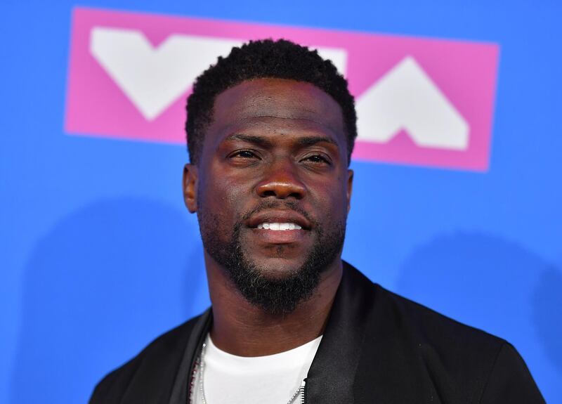 (FILES) In this file photo taken on August 20, 2018 US actor/comedian Kevin Hart attends the 2018 MTV Video Music Awards at Radio City Music Hall on August 20, 2018 in New York City.  US comedian and actor Kevin Hart announced on December 4, 2018, that he would be hosting the 91st Academy Awards in February. / AFP / ANGELA WEISS
