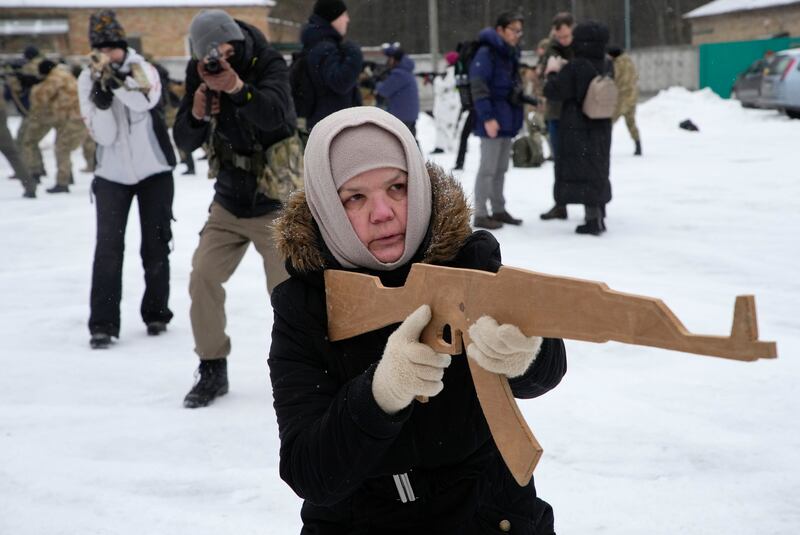 Rumia, 59, a member of Ukraine's Territorial Defence Force, trains near the capital Kiev. AP