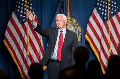 MANCHESTER, NH - JUNE 03: Former Vice President Mike Pence waves after addressing the GOP Lincoln-Reagan Dinner on June 3, 2021 in Manchester, New Hampshire. Pence's visit to New Hampshire would be the first time back since he was Vice President.   Scott Eisen/Getty Images/AFP
== FOR NEWSPAPERS, INTERNET, TELCOS & TELEVISION USE ONLY ==
