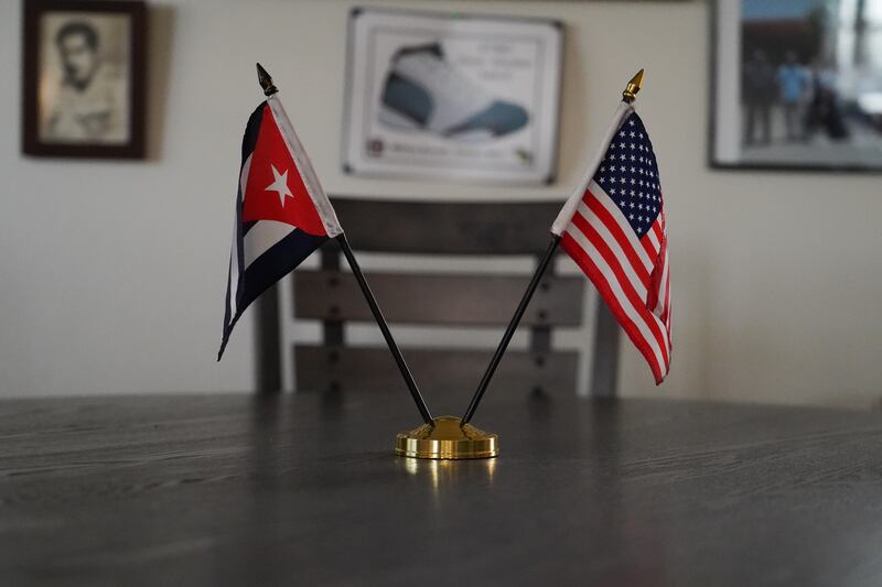 The Cuban and American flags sit on a table at the Cuban Community Centre at US Naval Station Guantanamo Bay. Willy Lowry / The National