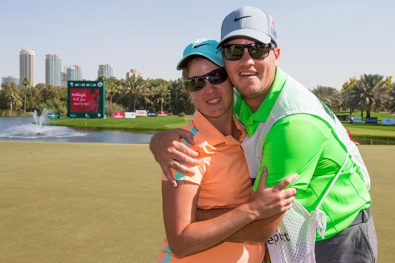 European Tour golfer Ashleigh Simon and her caddie-boyfriend, now fiance, David Buhai shown after their engagement on Saturday at the Dubai Ladies Masters. Tristan Jones / European Tour