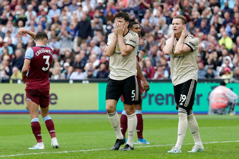 Harry Maguire of Manchester United and Scott McTominay react. Getty Images