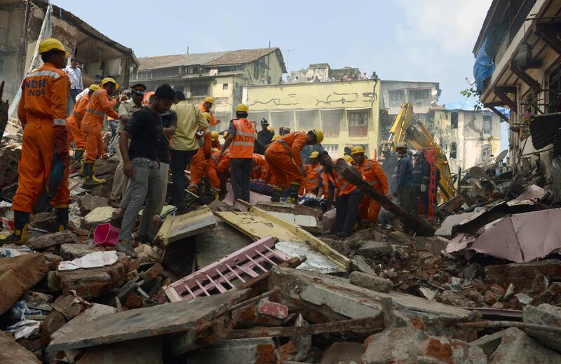 An official in the control room of India's National Disaster Response Force (NDRF) said seven bodies had been pulled from the rubble and that around 30 more were still thought to be trapped. Punit Paranjpe / AFP Photo
