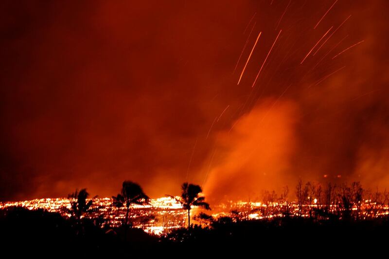 Gas erupts from a lava flow on the outskirts of Pahoa during ongoing eruptions of the Kilauea Volcano in Hawaii. Terray Sylvester / Reuters