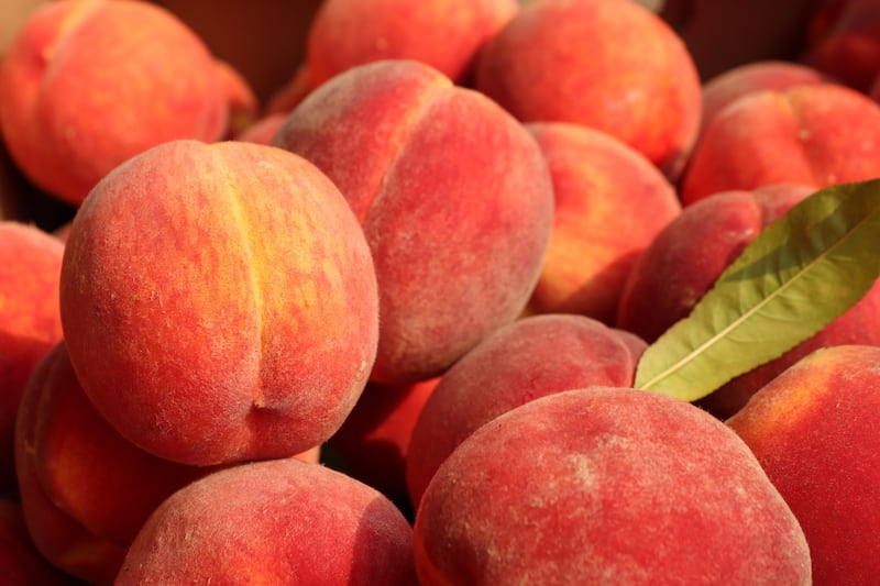 Peaches are also among the 12 foods on the list. Unsplash