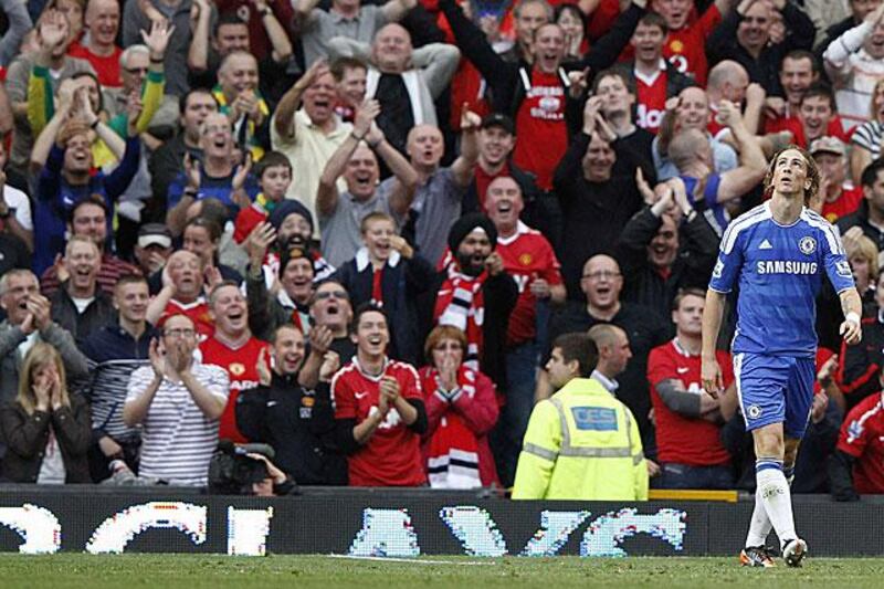 Fernando Torres, right, the subject of ridicule from Manchester United supporters after the Spanish Chelsea striker missed an open-goal in his side's 3-1 defeat.

Phil Noble / Reuters