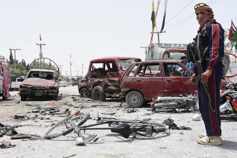 Security officials inspect the scene of a suspected suicide bomb attack in Quetta. EPA