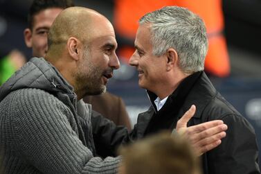 Manchester City manager Pep Guardiola, left, goes up against Jose Mourinho's Tottenham Hostpur on Sunday. AFP