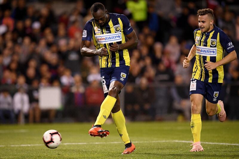 Usain Bolt in action for the Mariners against Macarthur South West United during a pre-season friendly at Campbelltown Sports Stadium in Sydney. EPA