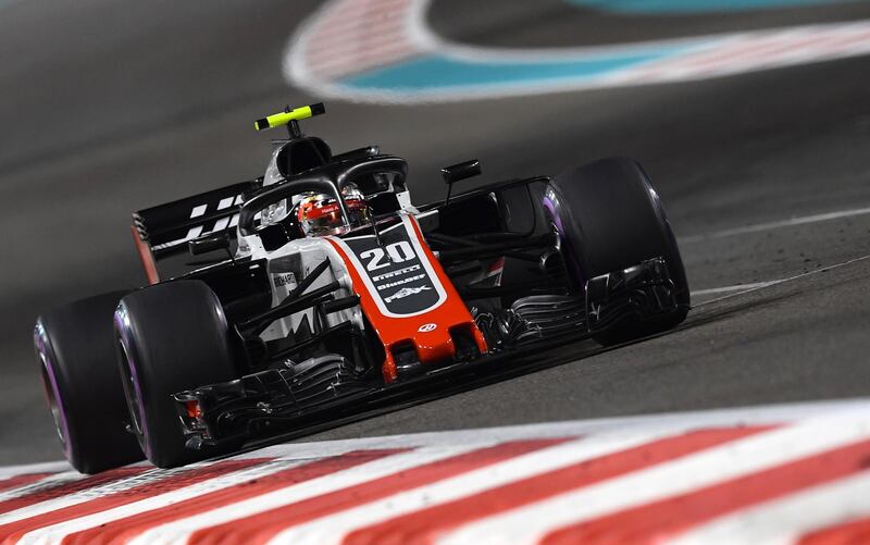 Haas F1's Danish driver Kevin Magnussen steers his car during the second practice session at the Yas Marina circuit on November 23, 2018, in Abu Dhabi, ahead of the Abu Dhabi Formula One Grand Prix. / AFP / GIUSEPPE CACACE
