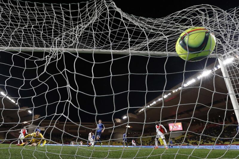 Monaco's French forward Kylian Mbappe Lottin scores a goal during the French L1 football match Monaco (ASM) vs Troyes (ESTAC) on February 20, 2016 at the "Louis II Stadium" in Monaco.  AFP PHOTO / VALERY HACHE (Photo by VALERY HACHE / AFP)