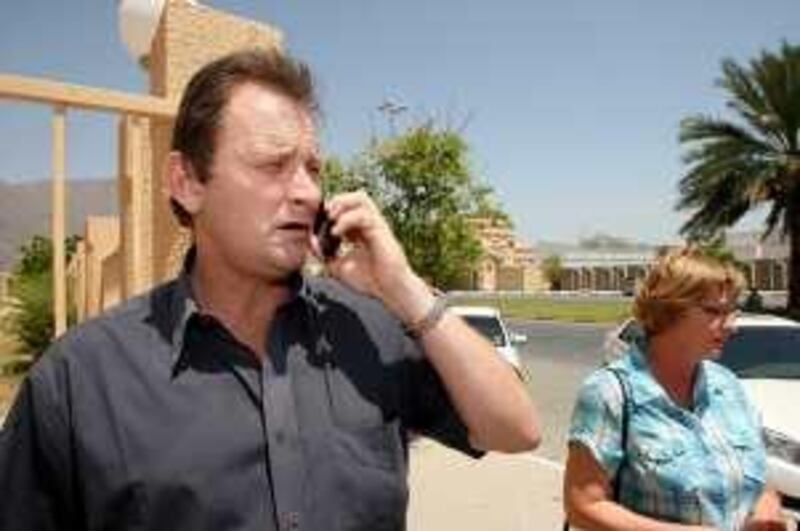 SHARJAH, UNITED ARAB EMIRATES Ð June 1: Left to Right- Freddie Hillier and Ina Hillier parents of South African woman who is facing court case outside the Khor Fakkan Court in Sharjah.  (Pawan Singh / The National) For News. Story by John Henzell
 *** Local Caption ***  PS04- COURT CASE.jpg