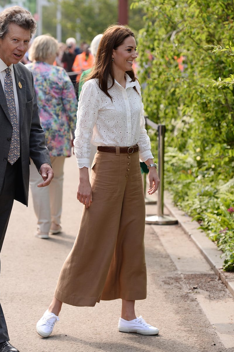 The Duchess of Cambridge wears linen culottes by Massimo Dutti, a Mabel Shirt by MiH Jeans, Superga Cotu pumps and Monica Vinader Siren earrings to unveil her 2019 RHS Chelsea Flower Show garden on May 20. Getty Images