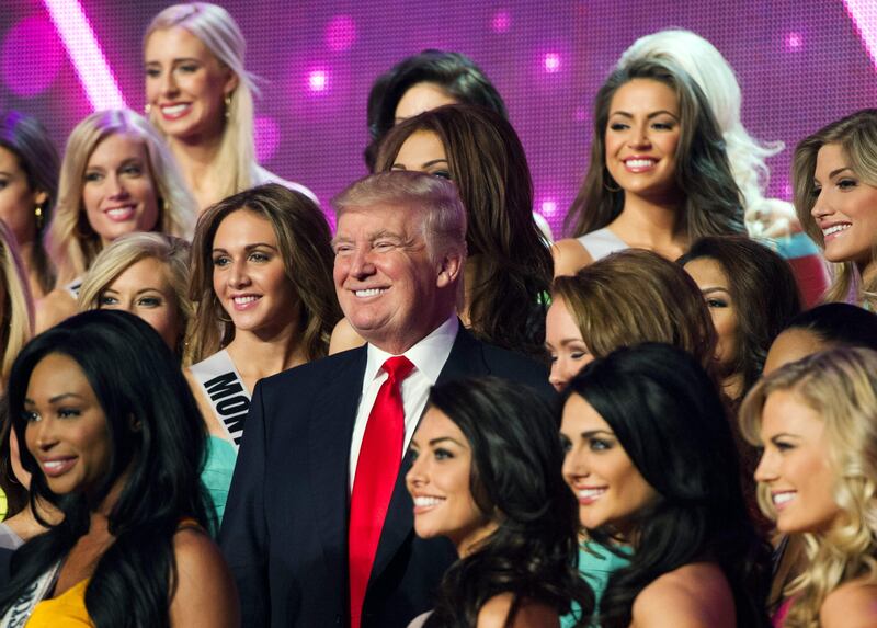 In this photo provided by the Miss Universe Organization, Donald Trump, co-owner of the Miss Universe Organization, poses for a photo with the competitors during rehearsal for the upcoming Miss USA Competition at PH Live in Las Vegas on Saturday, June 15, 2013. (AP Photo/Miss Universe Organization) *** Local Caption ***  Miss Universe USA.JPEG-0b051.jpg