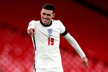 England's Phil Foden celebrates scoring his side's third goal against Iceland at Wembley. PA