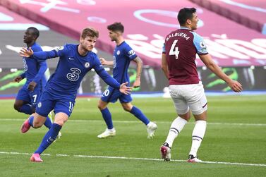 Chelsea's Timo Werner celebrates after scoring his side's opening goal during the English Premier League soccer match between West Ham United and Chelsea at London Stadium, London, England, Saturday, April 24, 2021. (Andy Rain/Pool via AP)