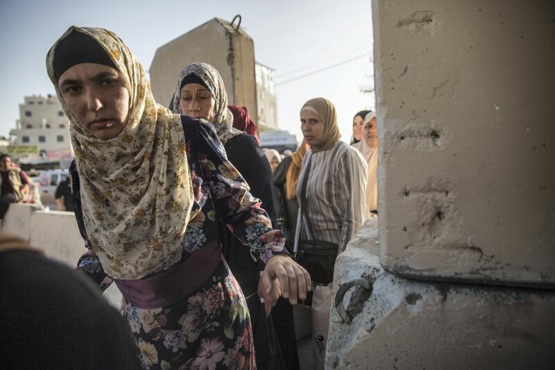 Palestinian women of all ages  crossing the Qalandia checkpoint to pray in Jerusalem on May 17,2019. The Friday mornings during Ramadan is the most crowded foot traffic time at Qalandia, as tens of thousands of Palestinians from all around the West Bank cross through to pray in Jerusalem. Photo by Heidi Levine for The National).
