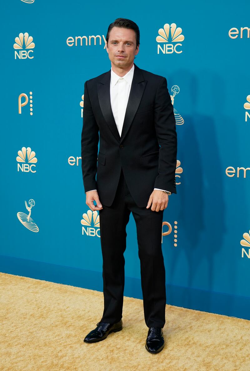 Sebastian Stan wearing a black Burberry tuxedo. AP Photo